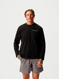Model wearing the Black Long Sleeve T-Shirt by Non-Athlete