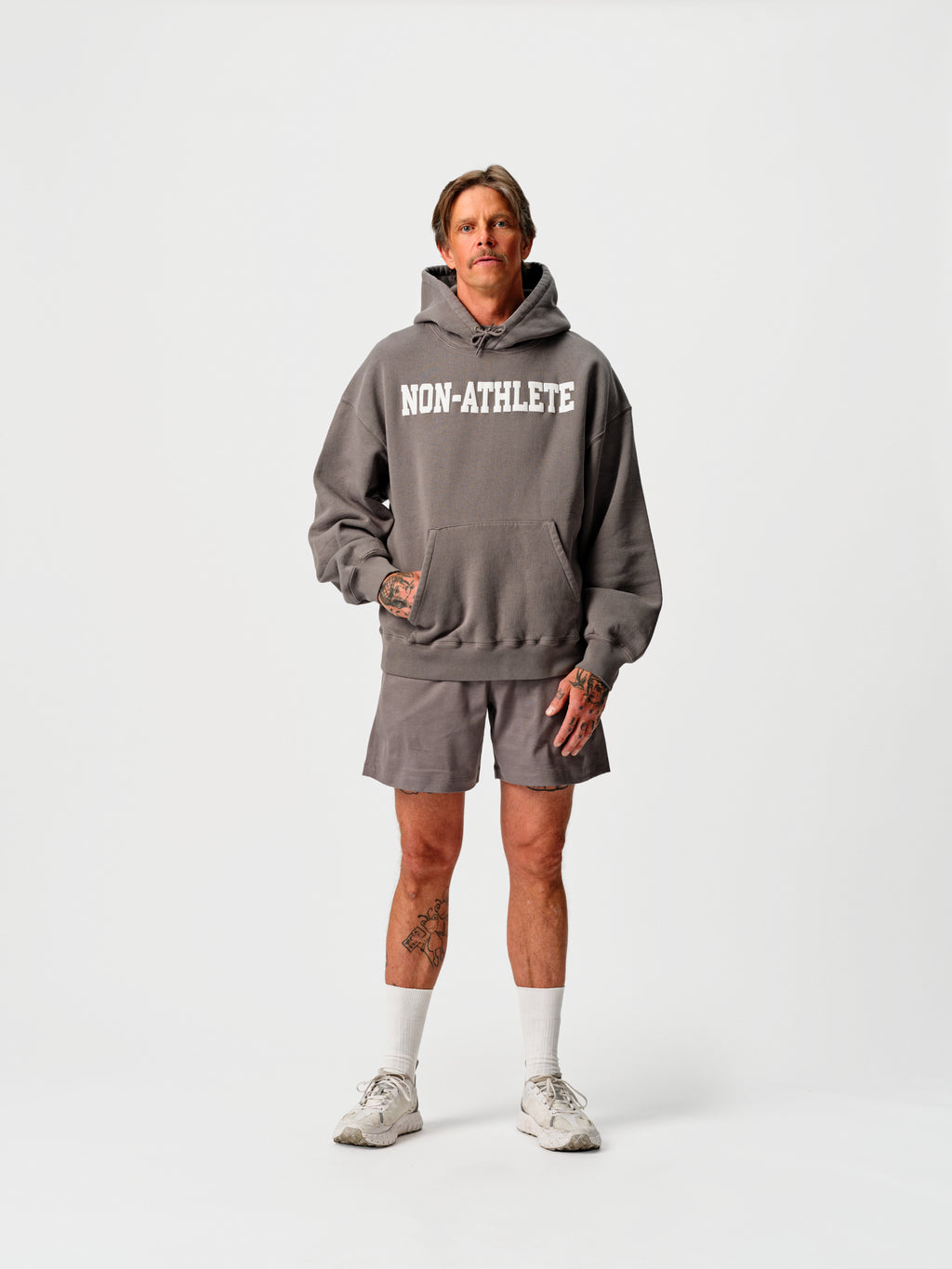 Model wearing the Boxy Hoodie Grey in heavyweight organic cotton by Non-Athlete